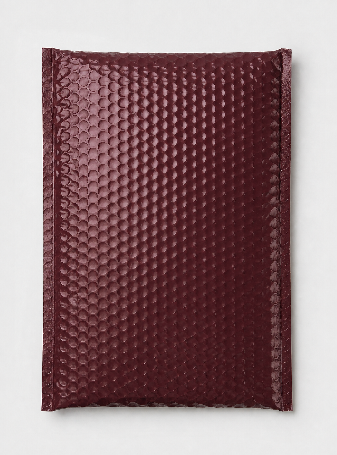 Sticker Mule style burgundy custom bubble mailer