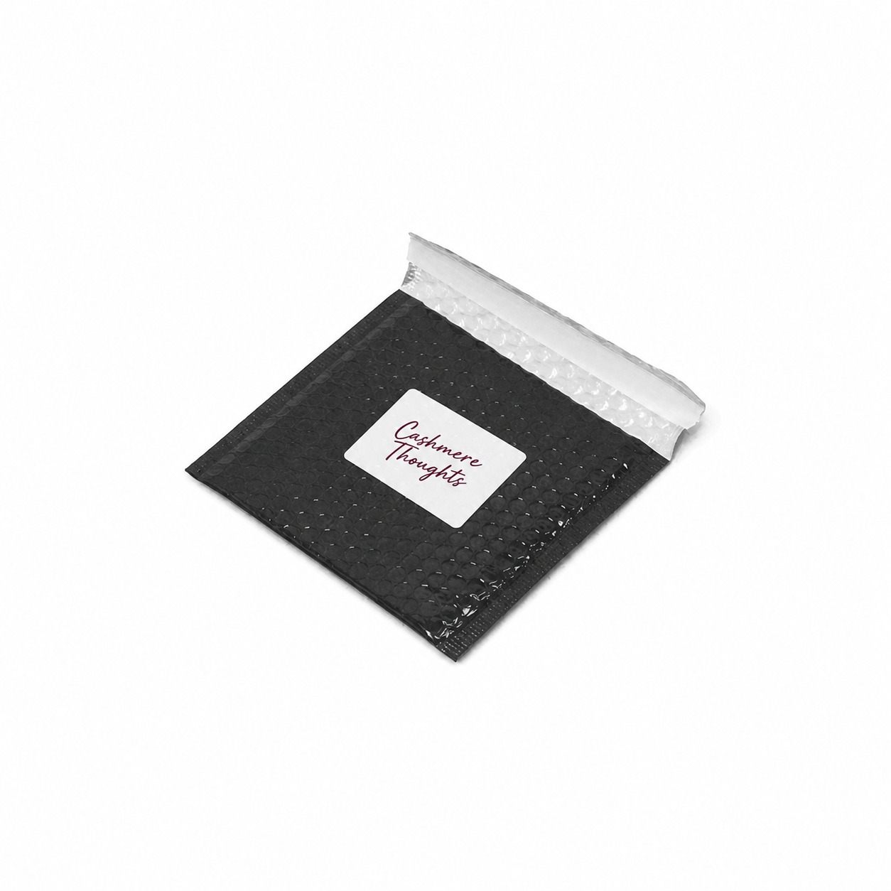 Kite black metallic CD bubble envelope with 75 by 50 millimetre Cashmere Thoughts sticker